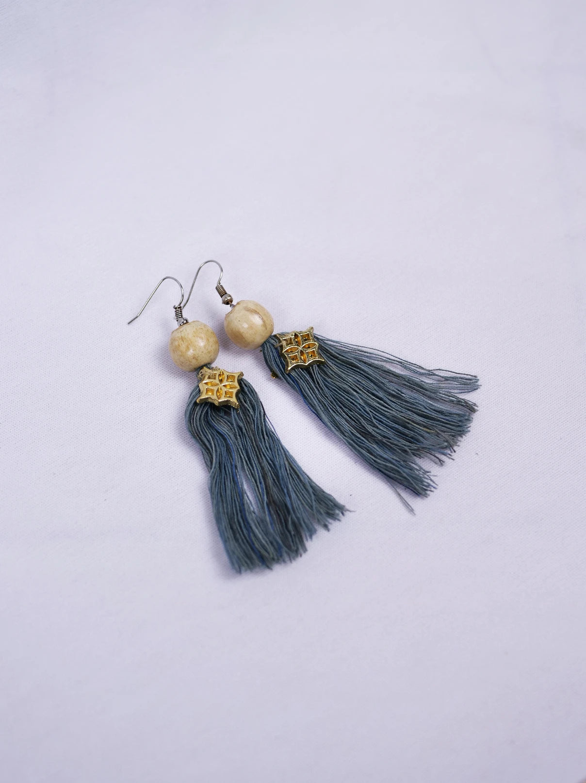 Boucles d'oreilles à pompons olive sourdes